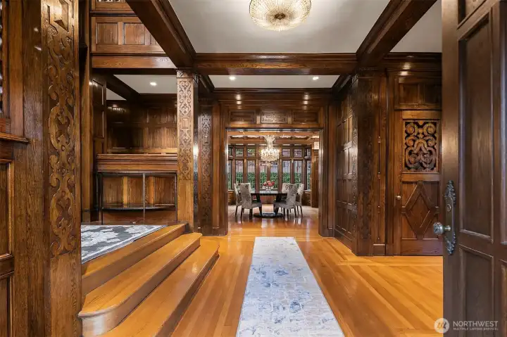 Hand carved Siberian Oak paneling graces the entry foyer, the dining room, the living room and the stairwell.