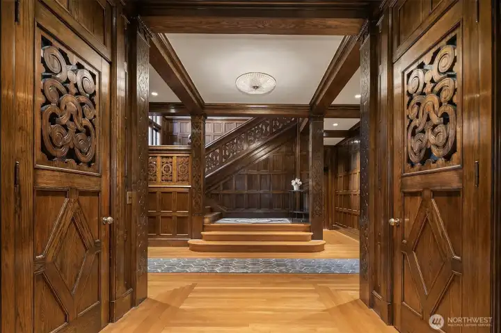 A second shot of the foyer taken from the living room. The door to the right is the entry closet. The door on the left is to the elevator.