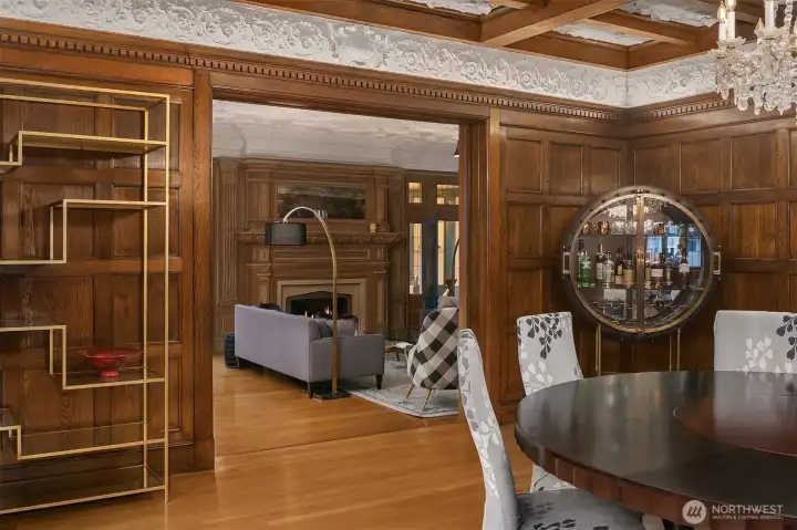 Another photo of the dining room looking towards the living room. Note the plaster details.