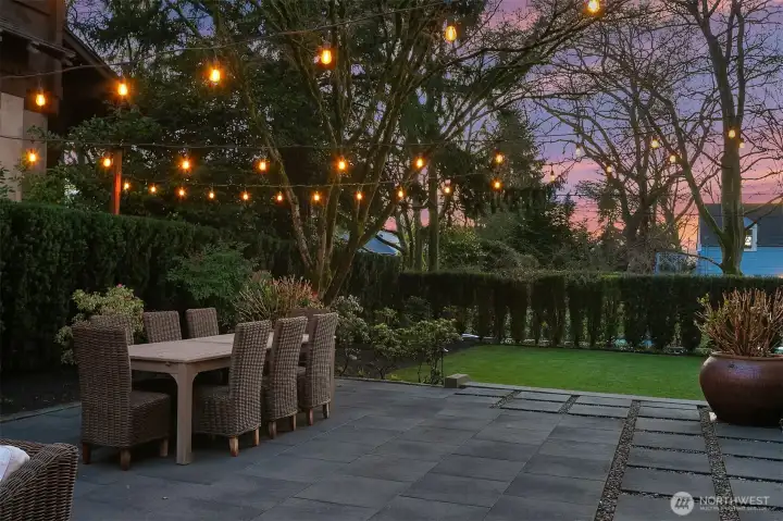 The patio area is surrounded by low maintenance gardens. A built-in sprinkler system is complete with a smart irrigation controller.