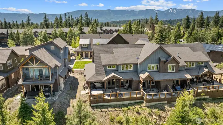Aerial view of home and neighborhood.