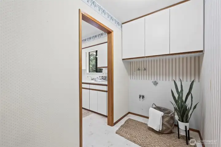 There is a washer/dryer hook up both upstairs and downstairs