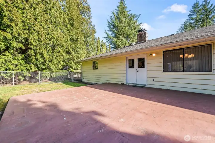 Large patio, perfect for entertaining or relaxing in your private park-like backyard!