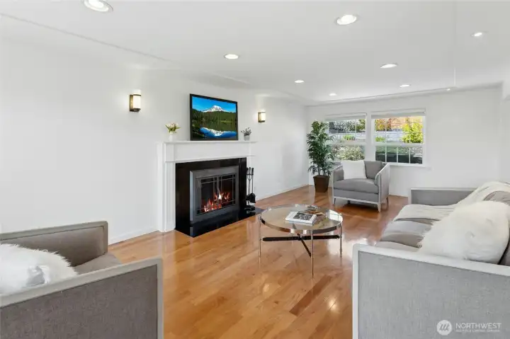 Spacious living room features 1 of 2 fireplaces.