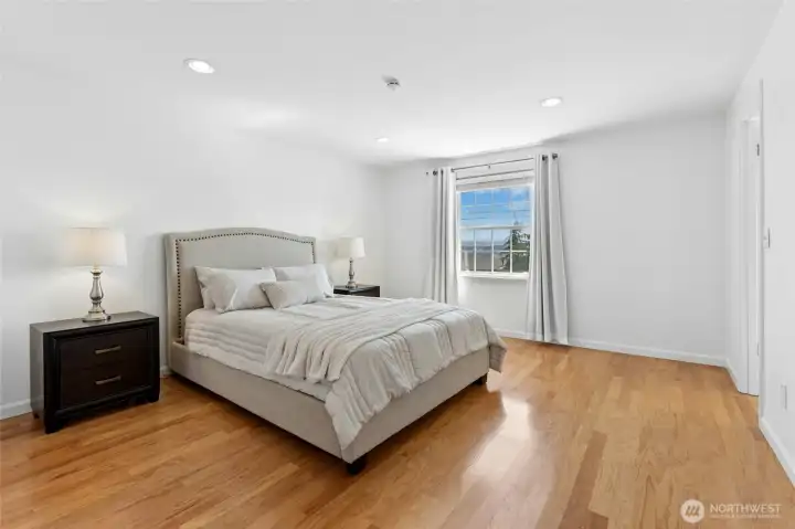 Primary suite has partial lake and mountain views.