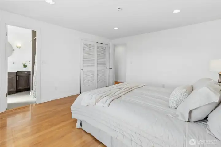 Primary suite looking into primary bath.