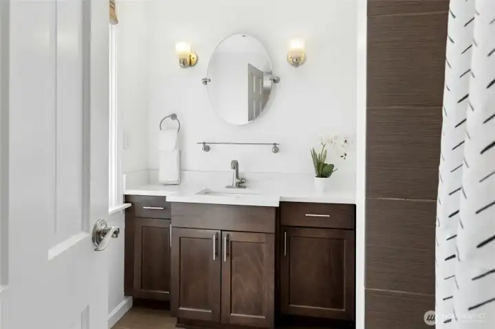 Primary three-quarter bath.