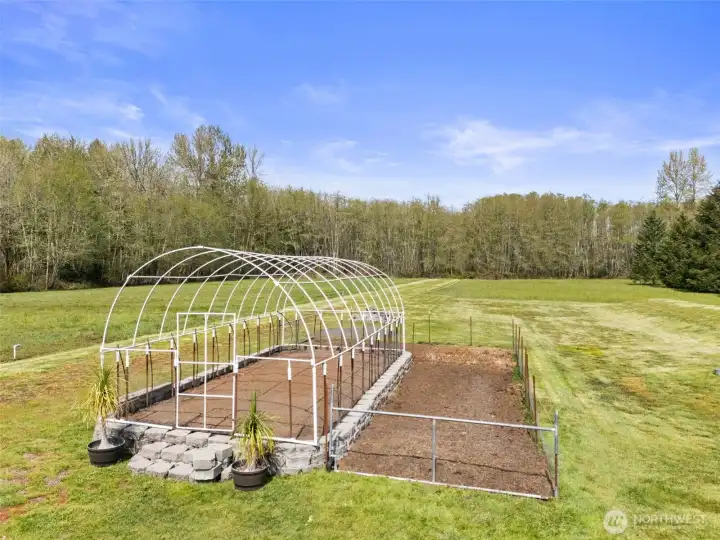 Green house and land beyond