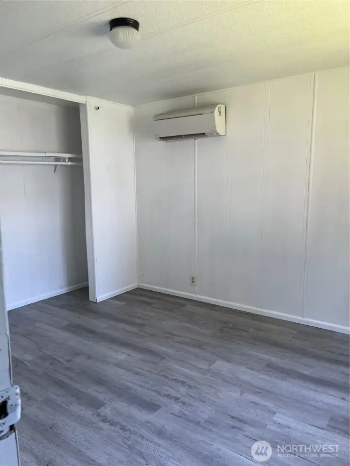 Large closet and new flooring in primary