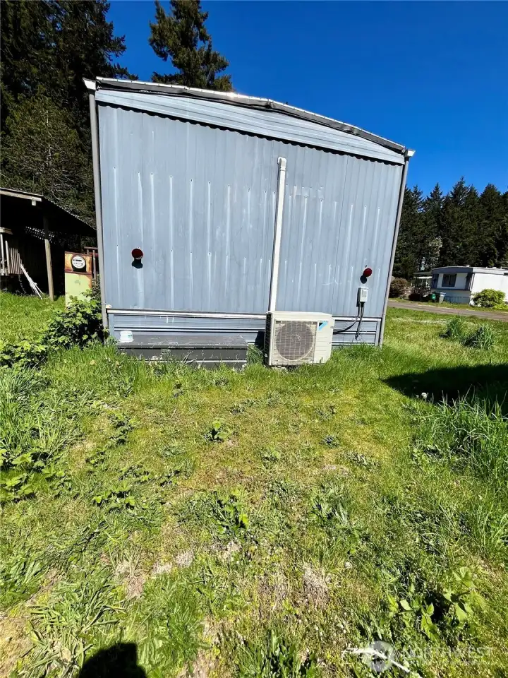 Back side of home with mini-split setup