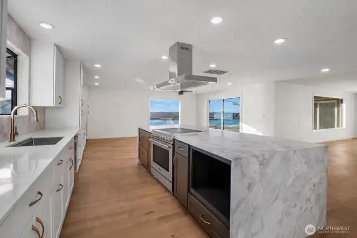 Modern finishes paired with functional design - 36" Electric Range is VIRTUALLY added - Stove is on order & will be install prior to closing