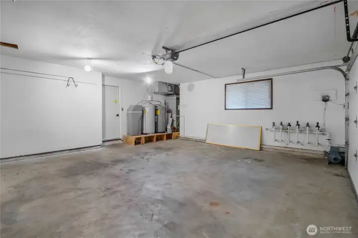 2-car attached garage with additional parking potential