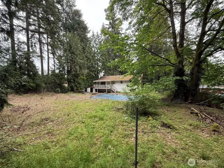 Back of home, huge back yard with swimming pool, potential development/DADU opportunity. Back of home, huge back yard with swimming pool, potential development/DADU opportunity.