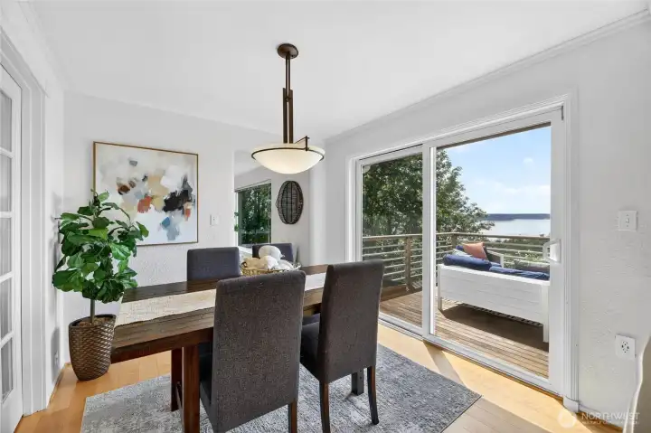 Dining room with sliders to large deck Dining room with sliders to large deck