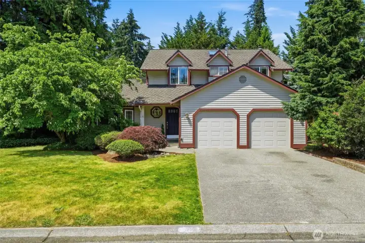Corner lot positioning adds privacy and curb appeal.