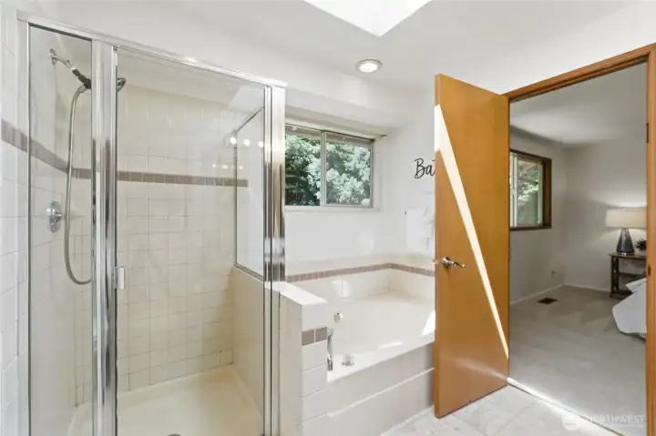 Separate tub & shower combo w/skylight that bathes the room in sunlight.