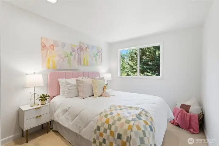 Three additional bedrooms provide flexibility. Ideal for guests, home offices, hobbies, or playrooms.