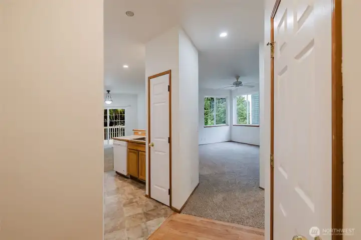 Entry opens up into the living room and the kitchen on the left with a coat closet on the right. Entry opens up into the living room and the kitchen on the left with a coat closet on the right.