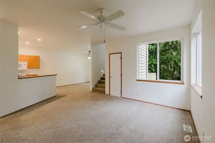 Step into the living room great room area this south window looks out to your back yard and the water of Liberty Bay. Step into the living room great room area this south window looks out to your back yard and the water of Liberty Bay.