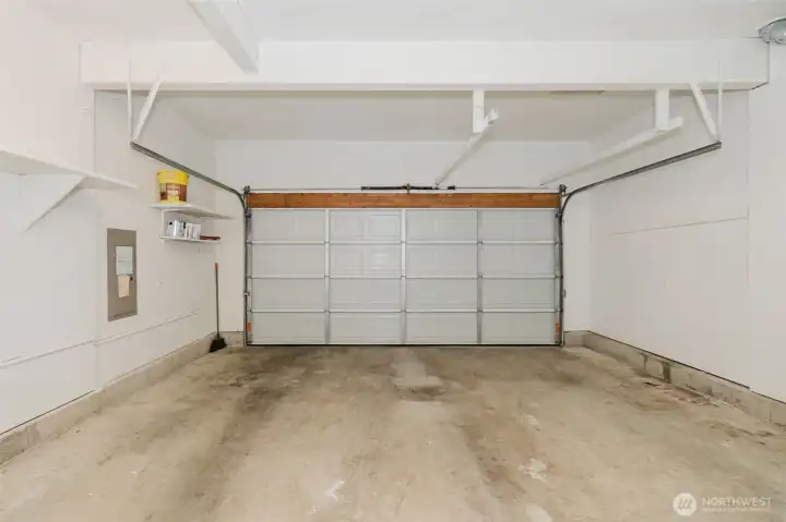 Large two car garage with a high ceiling. Large two car garage with a high ceiling.
