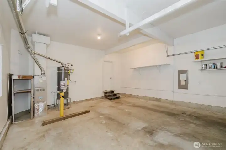 As you are driving into the garage this is the view looking at the door into the utility room. As you are driving into the garage this is the view looking at the door into the utility room.