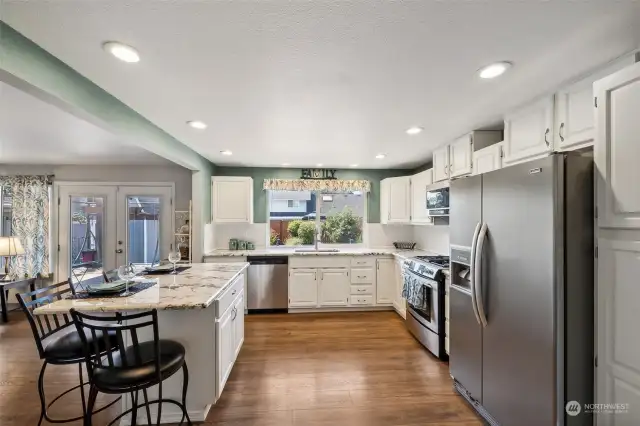 Enjoy the beautifully remodeled Kitchen & stainless appliances including gas range/oven.