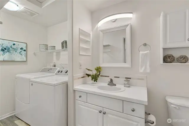 Spacious utility room off bathroom.