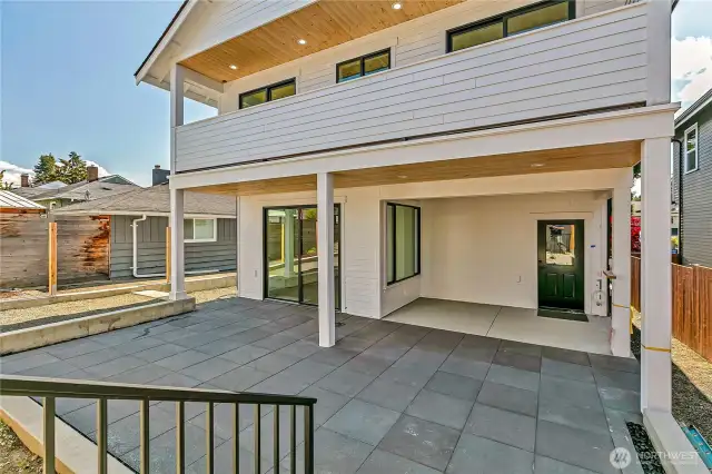 Custom slate pavers and covered patio spaces