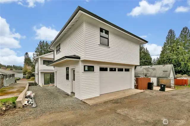 2 car garage w/Detached ADU featuring heated storage and off street parking