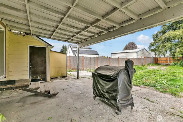 Covered patio for year round use. Man door to garage.
