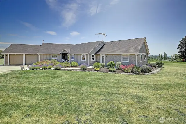Main home is 1913 sq ft with an attached 798 sq ft guest home with its own entrance...