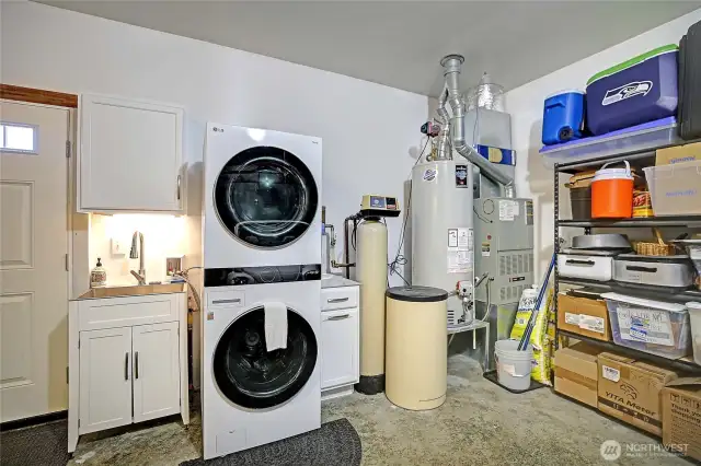 New water heater in 2023 with booster pump and hot water recirculating system. Stackable washer and dryer hooked up for the renter that's in the guest home...