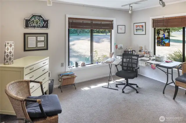 The second main level bedroom could be a flex space for your needs. With windows that face to the west and north - you have plenty of ambient natural light throughout the year.