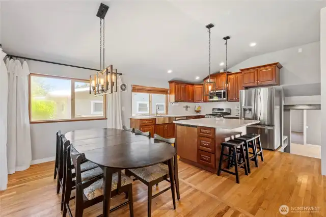 The updated Kitchen features a large island that is perfect for informal mealtimes, while the expansive dining area is available for larger or more formal settings. A great entertaining space!