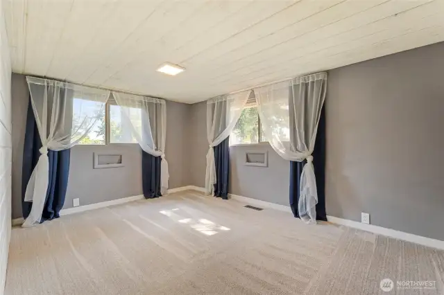 The upper level has two large bedrooms and a full bath! Bedroom #1 has a unique shiplap ceiling.