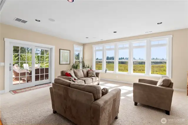 An unobstructed view from the livingroom with a sliding door to the large deck.