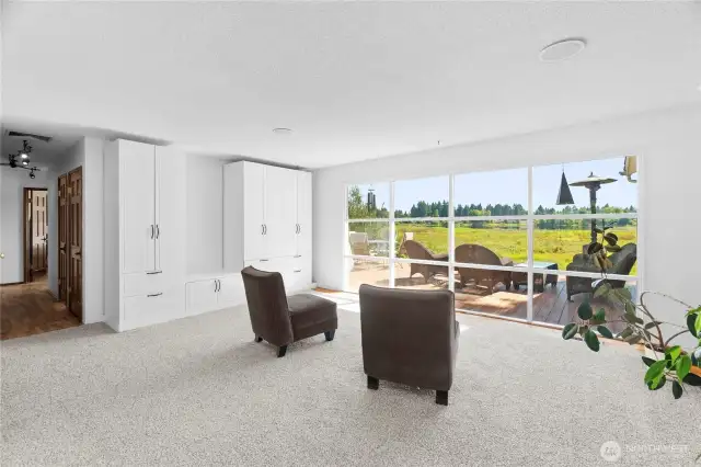 Family room is so bright with incredible lake views.
