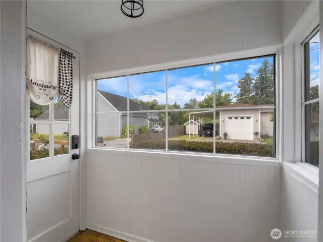 Mud room located conveniently alongside the kitchen