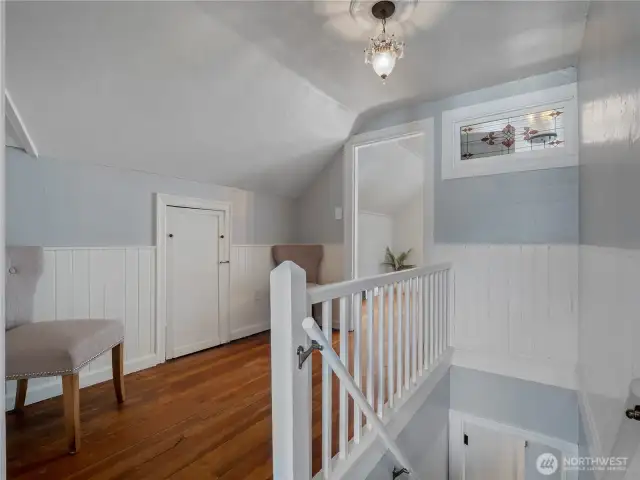 Upstairs hallway leading to second and third bedroom.
