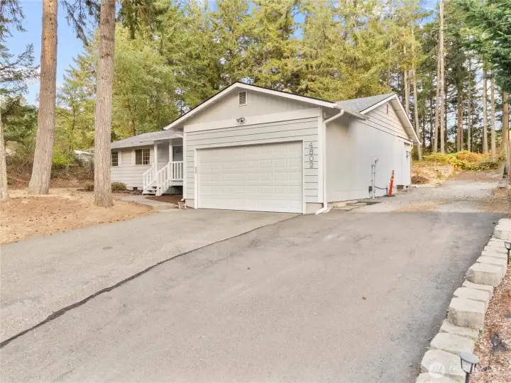 Private large lot with RV Parking and space for boat.