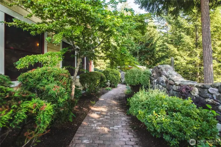 Fenced in yard with beautiful landscaping