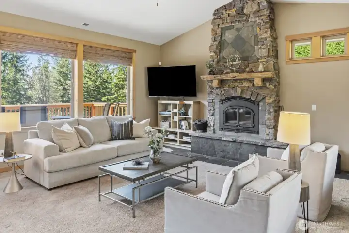 Beautiful River-Stone wood burning fireplace. Sunk-in Family room. Wood wrapped windows through-out.