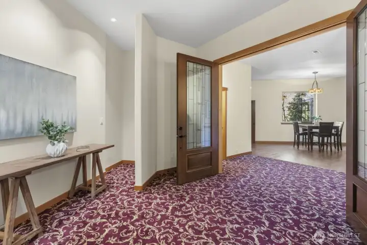 Lower level-Ready for a party !!! Large Wet bar with beer fridge/flat screen TV (conveys with property) ready for all your SEAHAWK parties!!  LIGHTS, READY, ACTION! Performance Stage with electrical for guitars, drums and speakers. Dance floor, bonus room for playing cards or board games, a non-conforming bedroom or office/den, expansive great room and covered patio with built-in BBQ kitchen for year around enjoyment.