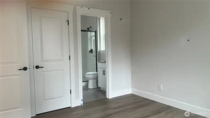 Bedroom on main with its own private bath and walk-in closet