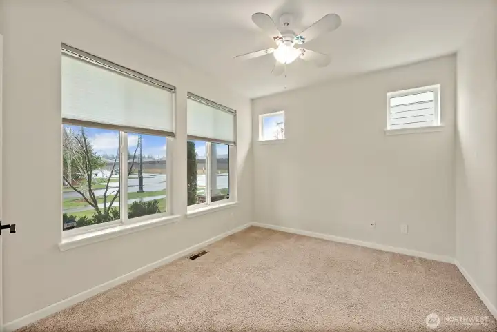 French Doors open to a front of the house office space.