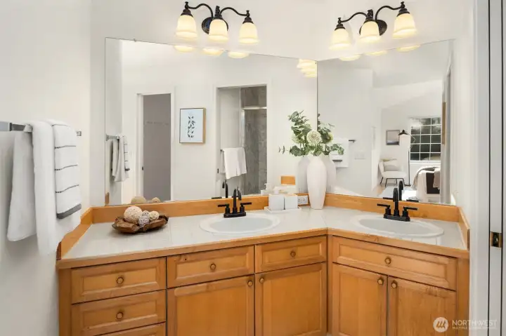 Spacious primary bathroom with so much counter and storage, and a walk-in closet!