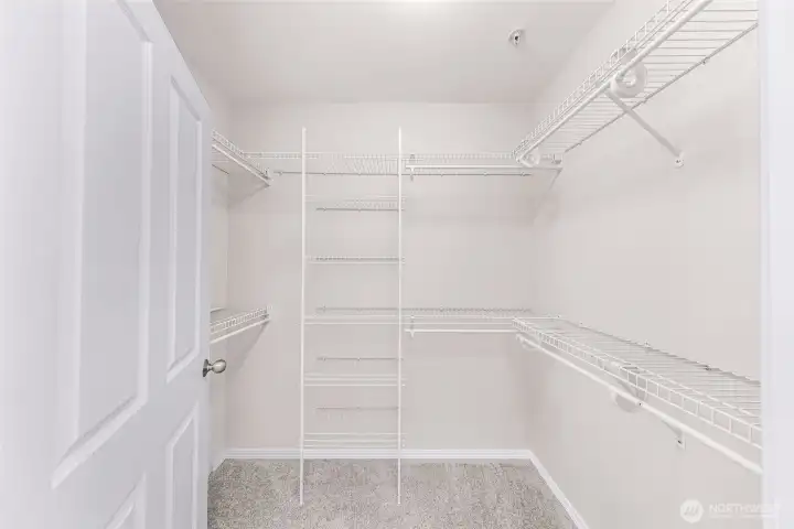 Primary suite walk-in closet, ready for your garments, shoes and hats!