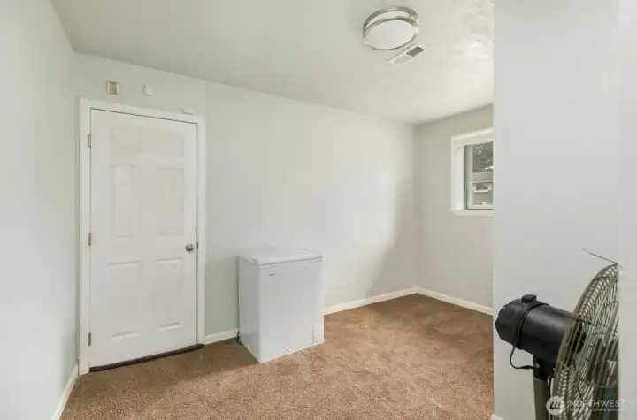 Bonus finished area on lower level off garage