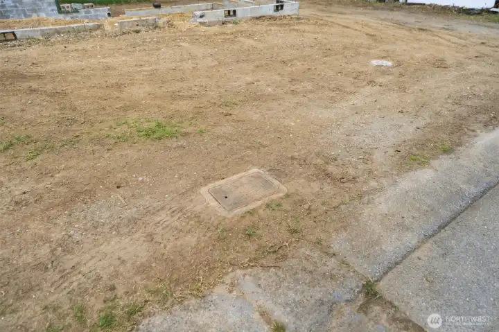 Existing utility access visible on-site, helping reduce infrastructure costs and streamline development. A valuable head start for builders looking to move quickly.