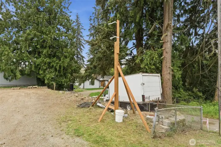 Temporary power pole and utility work already in place to support future construction. Infrastructure progress helps streamline your development timeline.